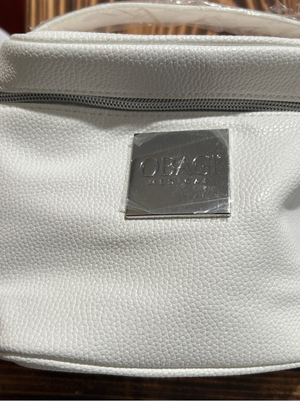 Obagi White Pebbled Leather Cosmetic Case with Metal Logo Plate